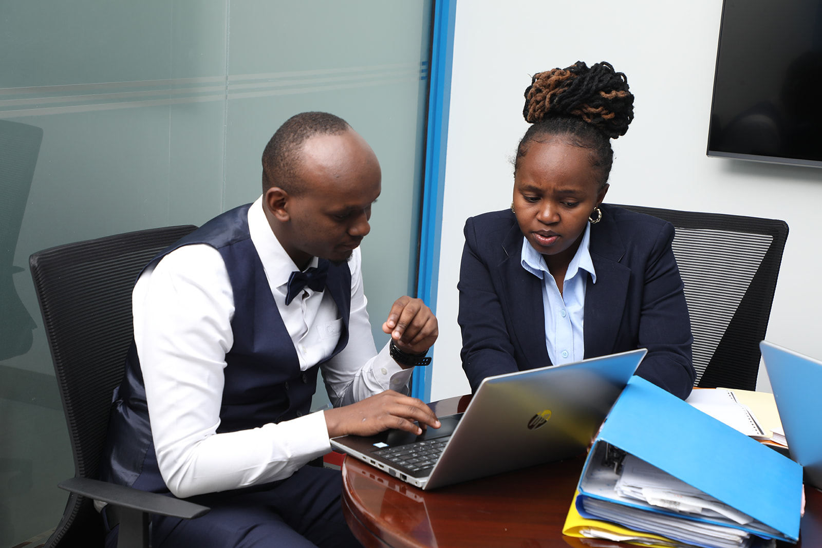Taxplan Consulting Team collaborating at desk